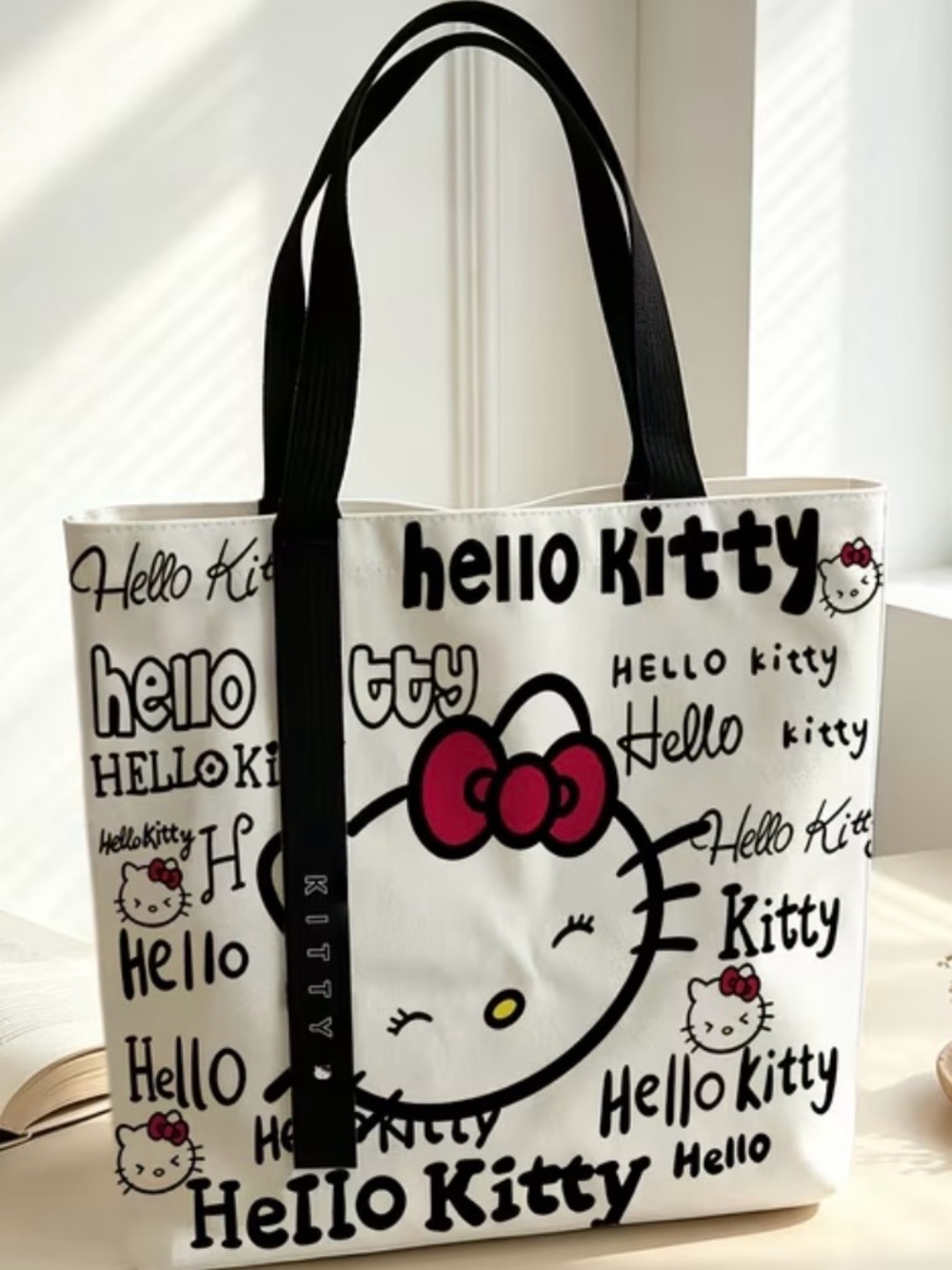 Hello Kitty Graphic Tote Bag with red Bow zipper top 13.5” x  13.5”  x  2